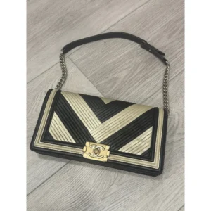 Chanel chevron gold and black shoulder boy bag
