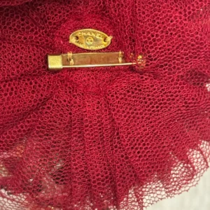 Alternative view of Chanel Camellia brooch in beige pink and brown.